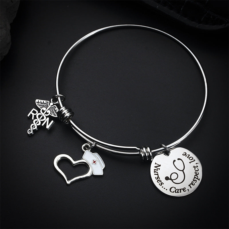 "Charm of a Nurse/Teacher" - Charm Bracelet
