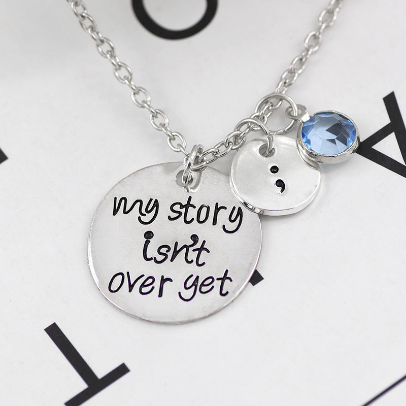 "My Story Isn't Over Yet" -  Crystal Charm Necklace