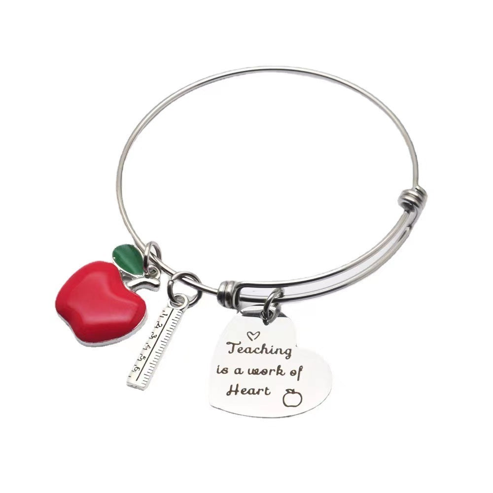 "Charm of a Nurse/Teacher" - Charm Bracelet