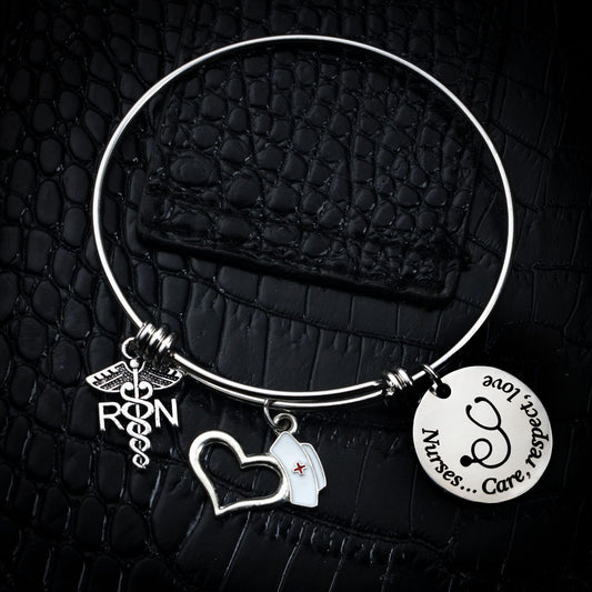 "Charm of a Nurse/Teacher" - Charm Bracelet