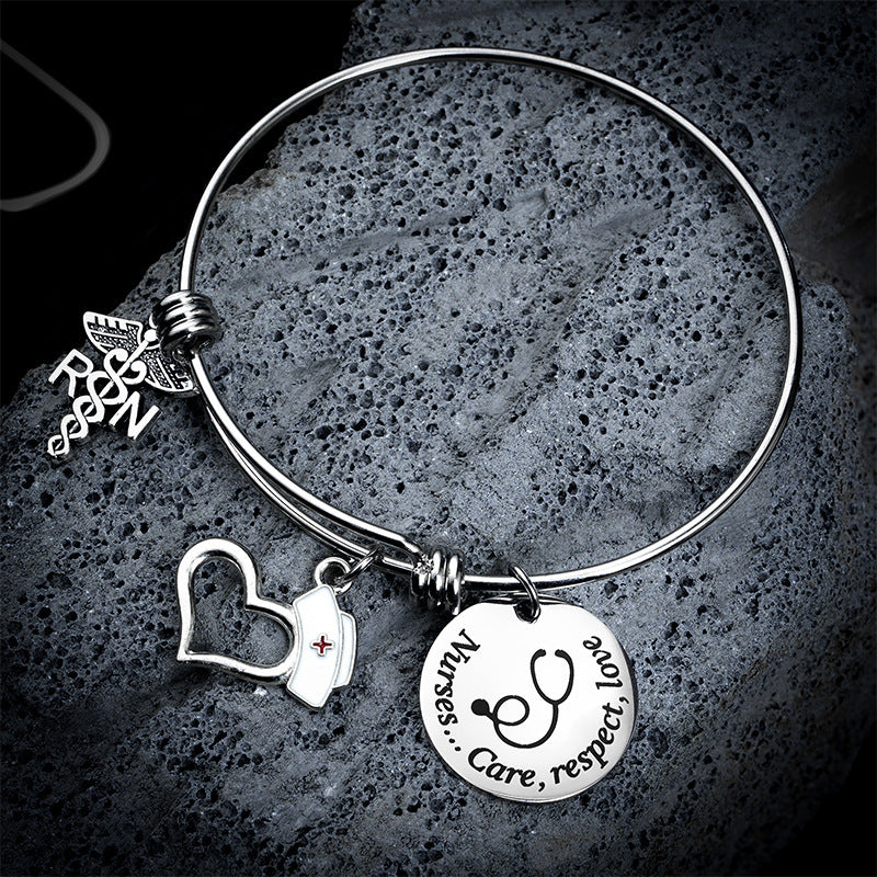 "Charm of a Nurse/Teacher" - Charm Bracelet