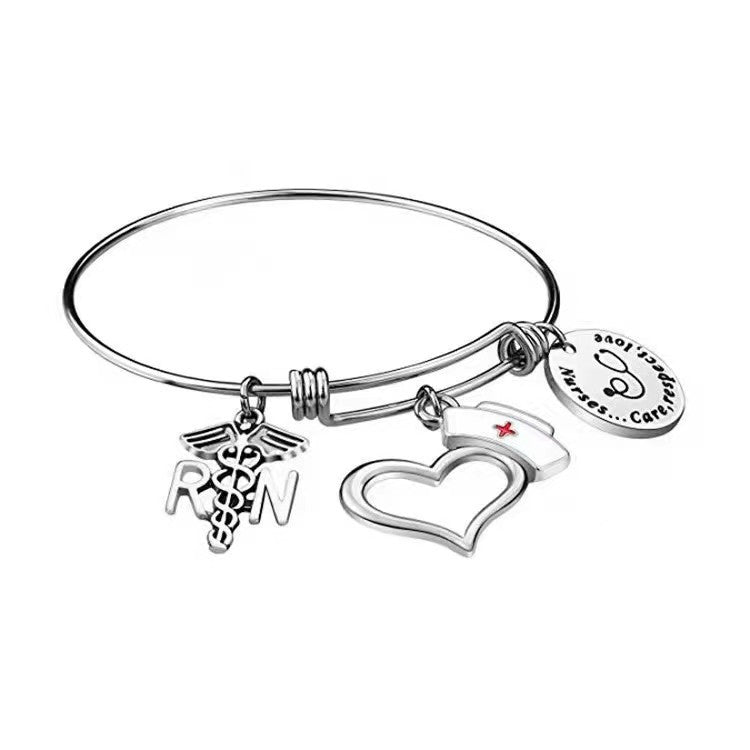 "Charm of a Nurse/Teacher" - Charm Bracelet